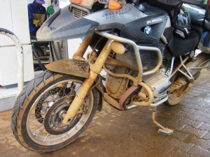 A mud splattered Big Fella stops to refuel in Mbabara...