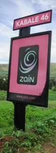 These bright signs are sponsored by Zain Telecom...