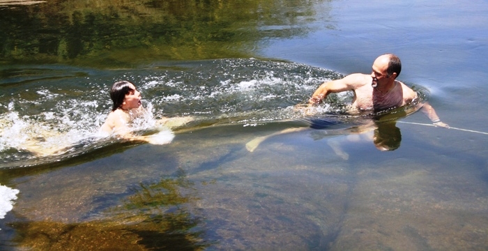 Sami and I hanging on in the rapids...