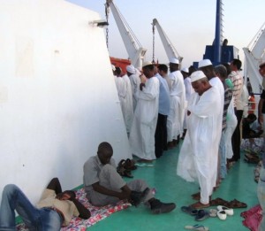 The Faithful gather to pray on deck...