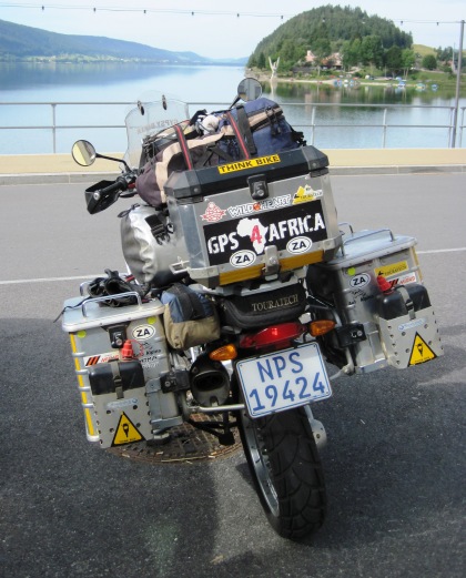 I sipped on a strong coffee while the Big Fella stood gazing out over Lac du Jeux....