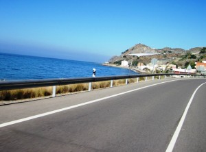 In some areas the road runs alongside the dazzling blue of the Mediterranean...