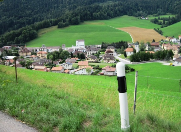 Pretty as a postcard... I rode past a number of villages just like this one...