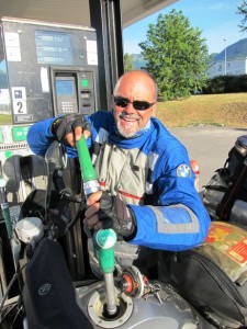 Pump jockey... Refueling before I cross into Switzerland where the price of fuel is a wallet-numbing €1.72 per litre...