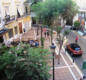 The Plaza Flores, outside my window, where locals sat until after midnight, enjoying food and spirit in equal quantities...