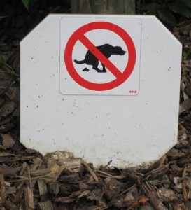In Europe, the sign seems to be directed at the dog itself...