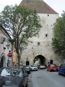 2. In Hainburg, just short of the border, the main road passes under the old fortrifications of the town. The road narrows to one lane, and traffic lights control the flow of traffic...