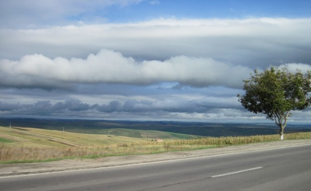 24. On the road to Turda, the sun tried bravely, but failed to make much of an impression on the dark skies...
