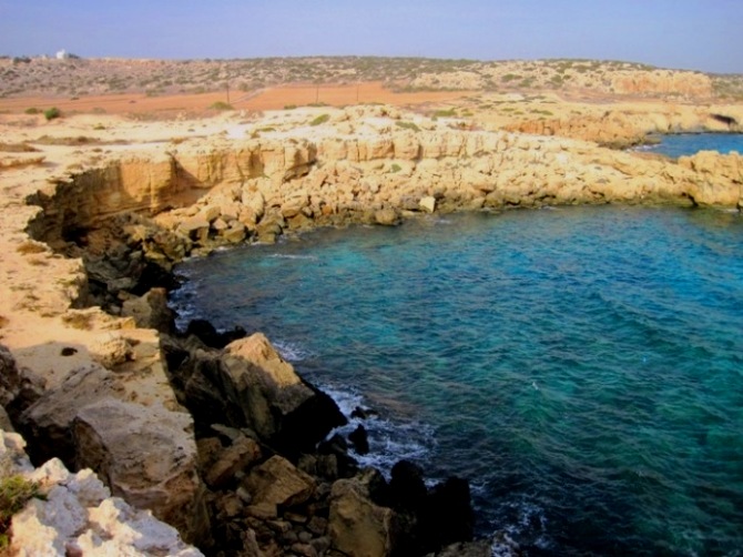 11. From up on the cliffs, I looked down onto the dazzling blue sea...