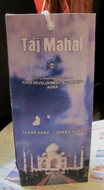 8. This colourful package contains a bottle of water and your shoe covers...