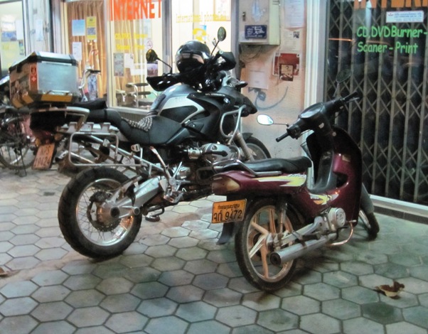 14. It continues to amaze me how big my bike is when it's parked next to one of the thousands of scooters...