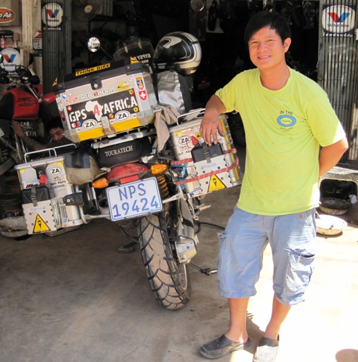 9. Ten minutes later, we were good to go...!! Fuark is your man to see if you have bike problems in Vientiane...!!