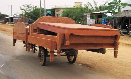 3. Four beds on a scooter and trailer...