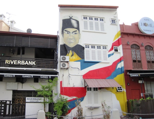 17. Many of the buildings lining the canal have been decorated with huge murals...