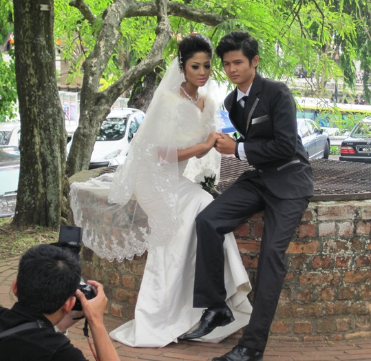 3. It was interesting to see this couple wearing western wedding attire... They seemed far too young to be tying the knot...!!