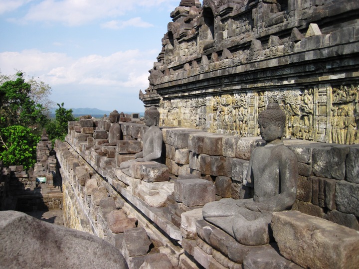 11. A line of statues of Buddha, all their heads intact, on the western side of the fourth gallery...