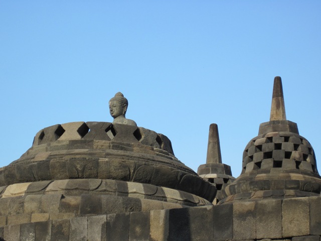 20. One stupa contains and undamaged statue of Buddha. The remainder of the stone blocks which