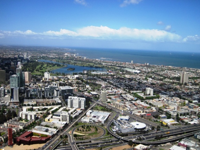 Looking out over Melbourne, with the F1 Grand Prix track that circles the waterway below...