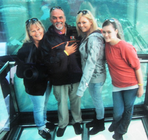 With only the glass floor between us and the street 81 floors below, we posed for the official photo...