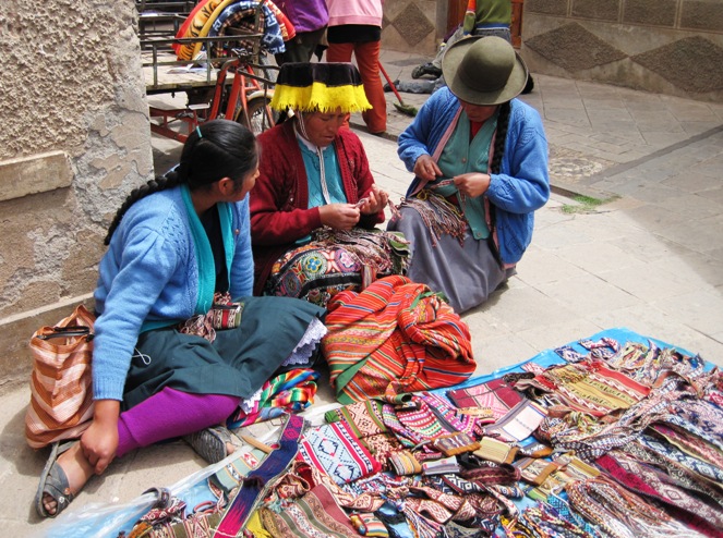 Outside on the sidewalk, their mothers and aunts were busy with their weaving and knitting...