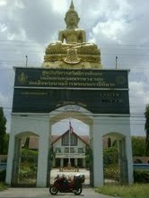 0. Receiving blessings from Buddha in Thailand.... The red scooter needs every one of them...!!