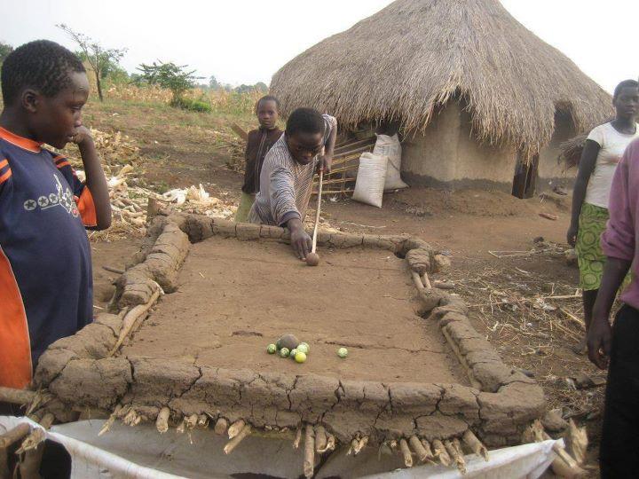 9. Sipho is hard at work, practicing for the upcoming East African Snooker Championships....