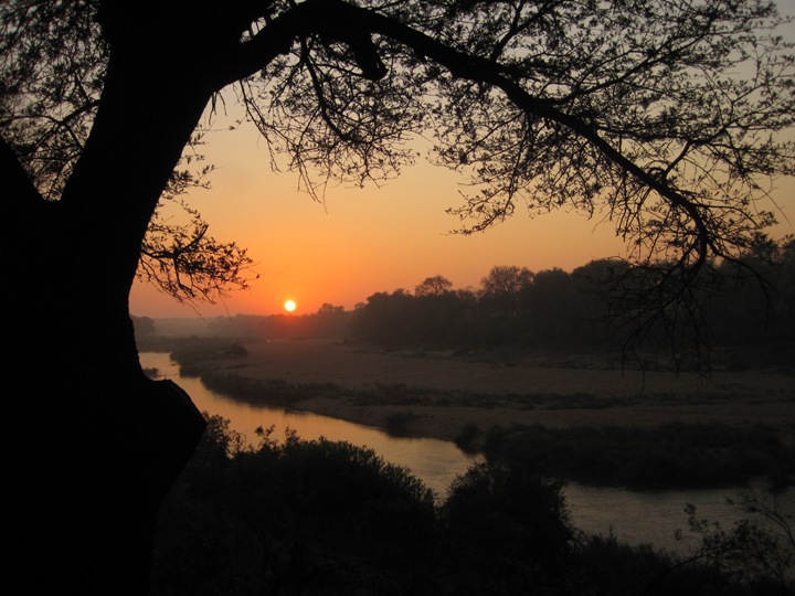 22. At 6.00 am this morning, I was up to watch the sun bloody the sky over the Sabie River.... A sight I will never get used to, and one that heralds the beginning of a bright new day in Africa....