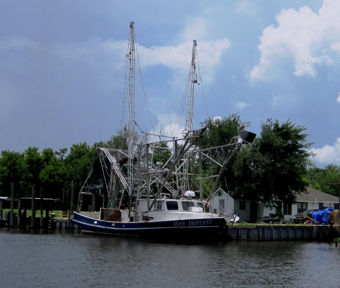 Shrimper on the channel. Most of the people in this area make their living from fishing, be it for crab or for shrimp.