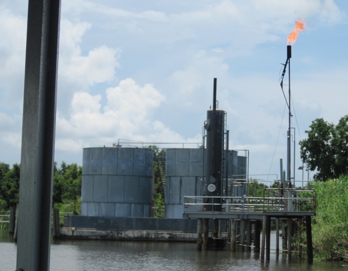 Apparently there are thousands of these pumpinmg stations scattered througout the swamplands of Louisiana.