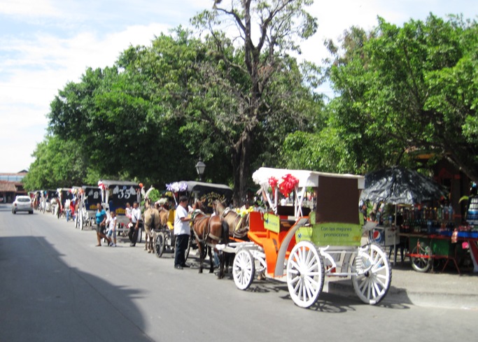 11. These colourful carriages take tourists for short trips through the old part of the city.... They uses the Plaza de la Independence as a terminus...