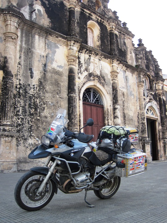 22. Parked right outside the door of the La Merced Church.... From the outside, it looks like it has been through a war.... And it has too...!!