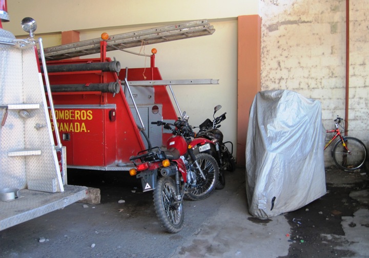 6. Tucked behind the only operating fire truck in town... The other one just out of the picture, was without an engine at the time I was there....!!