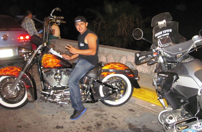 15. Ishmael on his Harley... I lost count of the number of car alarms that were set off as he roared past them...!!