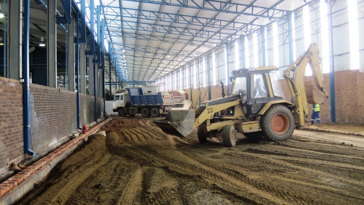 250 m3 of soil is brought in to raise the level of this factory to match the existing one next to it...